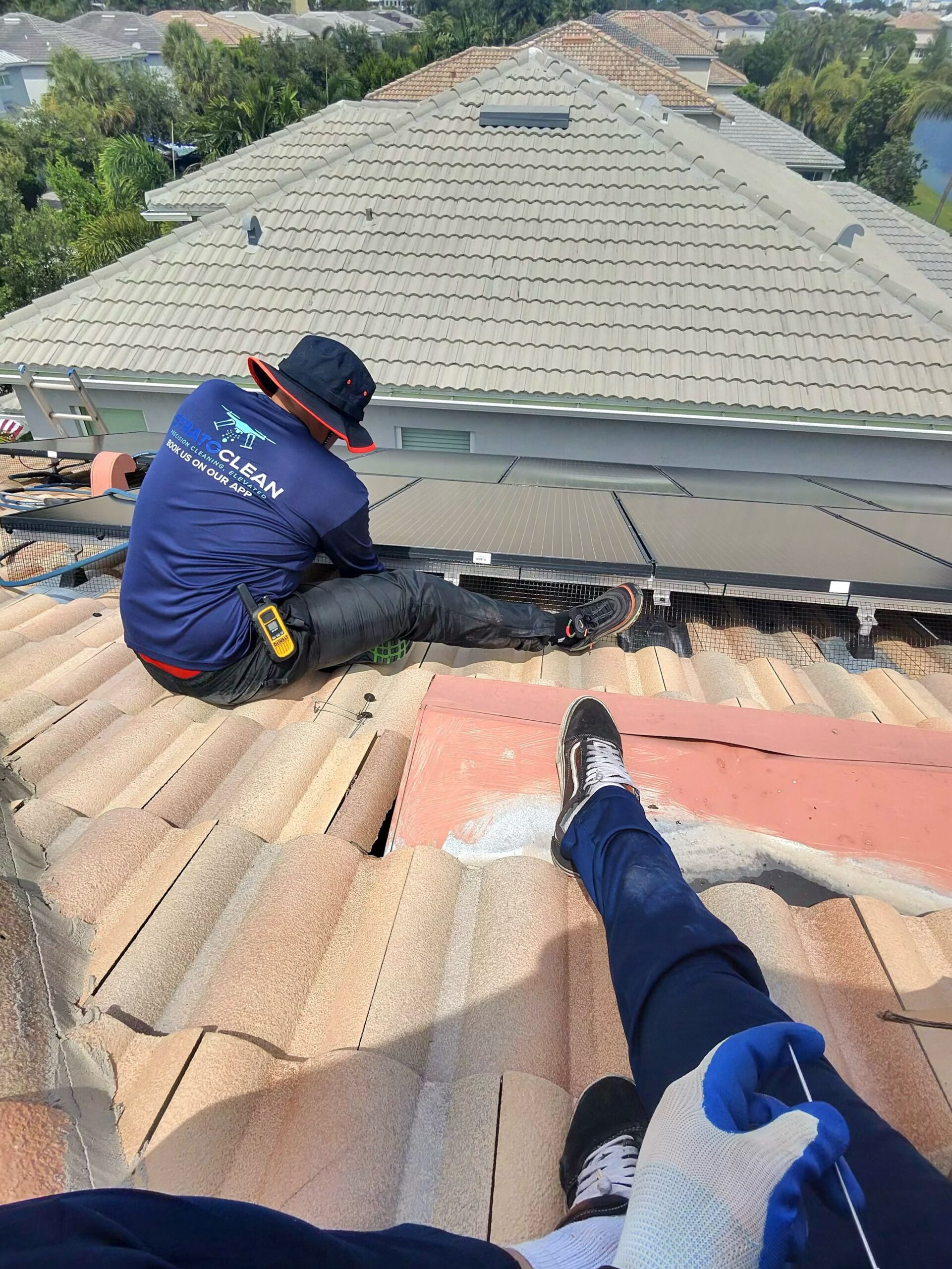 StratoClean bird-proofing under a residential solar panel array