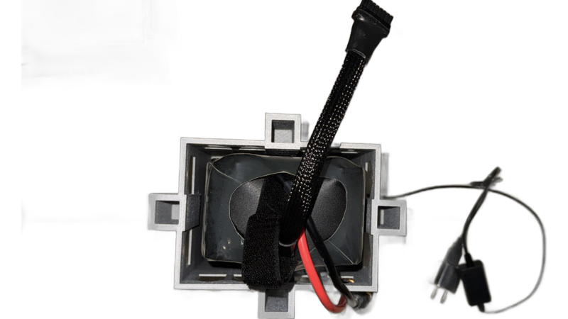 Top view of a 12S drone battery sitting in the battery cool-down station